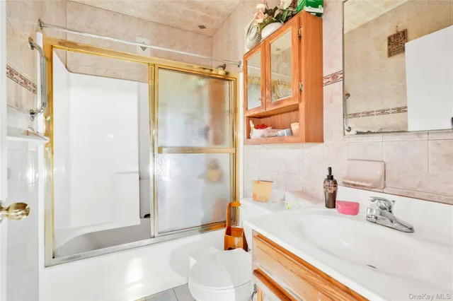 a bathroom with a sink and a shower