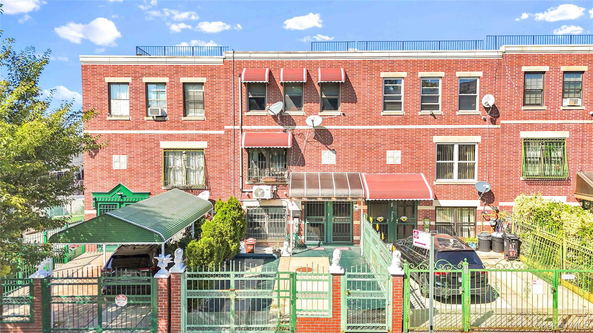 49 Hull Street Brooklyn, NY 11233 - Photo 24 of 31 a front view of a building with balcony