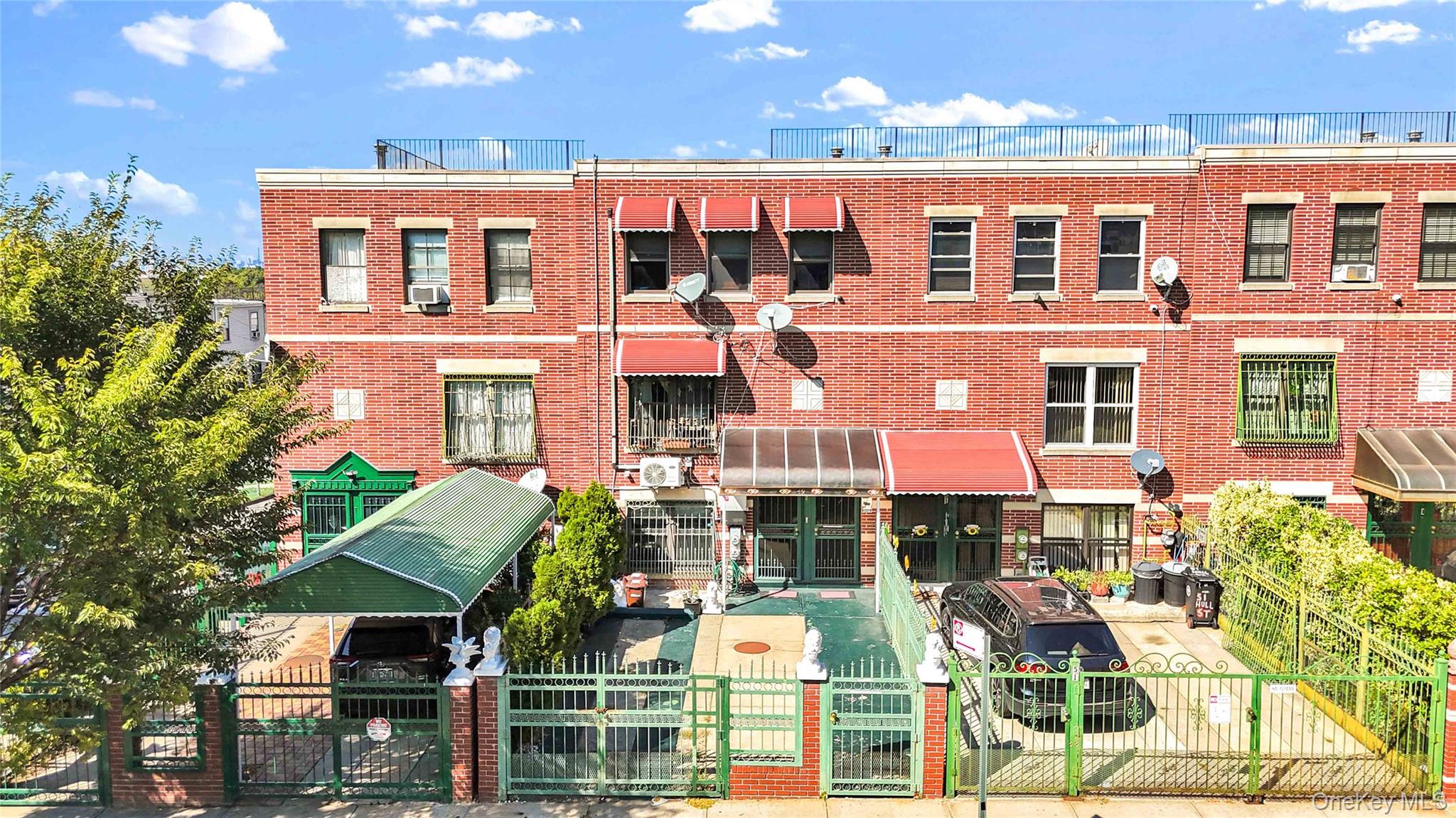 49 Hull Street Brooklyn, NY 11233 - Photo 26 of 31 a front view of multiple houses