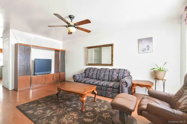 a living room with furniture and a rug
