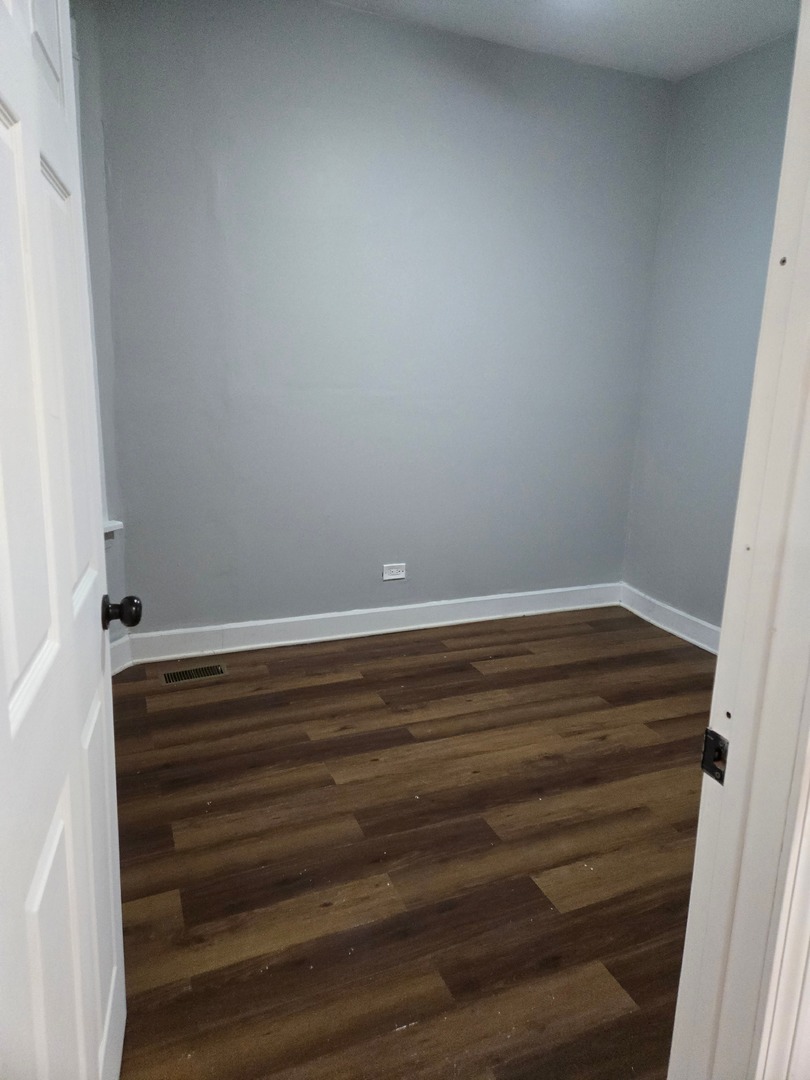 6229 South Bishop Street, Unit 1 Chicago, IL 60636 - Photo 8 of 17 a view of small space with racks on the wall