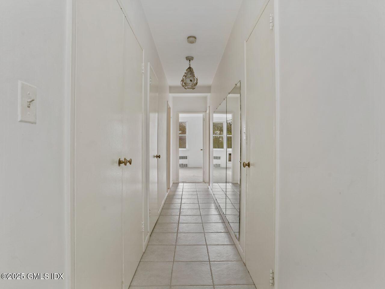 3 Putnam Hill, Unit 2B Greenwich, CT 06830 - Photo 14 of 23 a hallway with a door