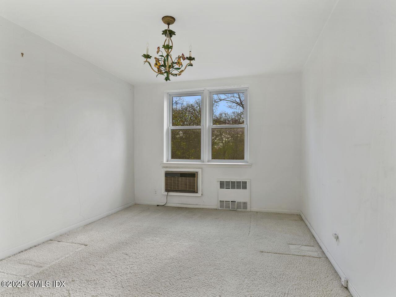 3 Putnam Hill, Unit 2B Greenwich, CT 06830 - Photo 18 of 23 an empty room with a window