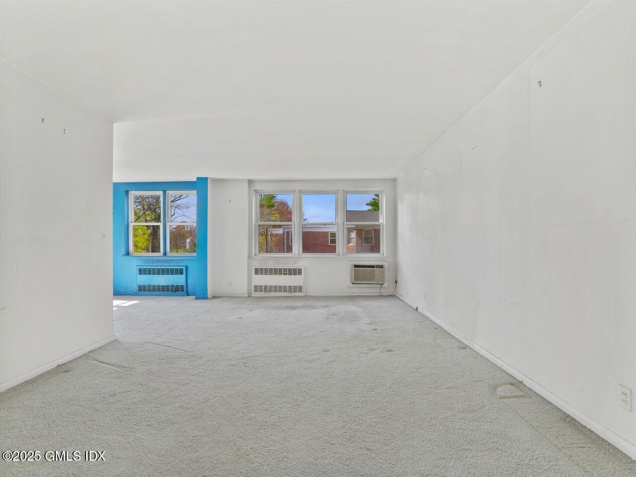 3 Putnam Hill, Unit 2B Greenwich, CT 06830 - Photo 7 of 23 an empty room with window