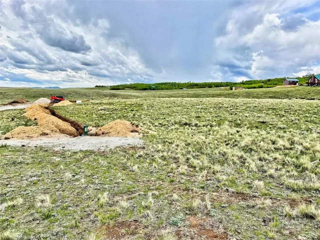 a view of a lake and a yard