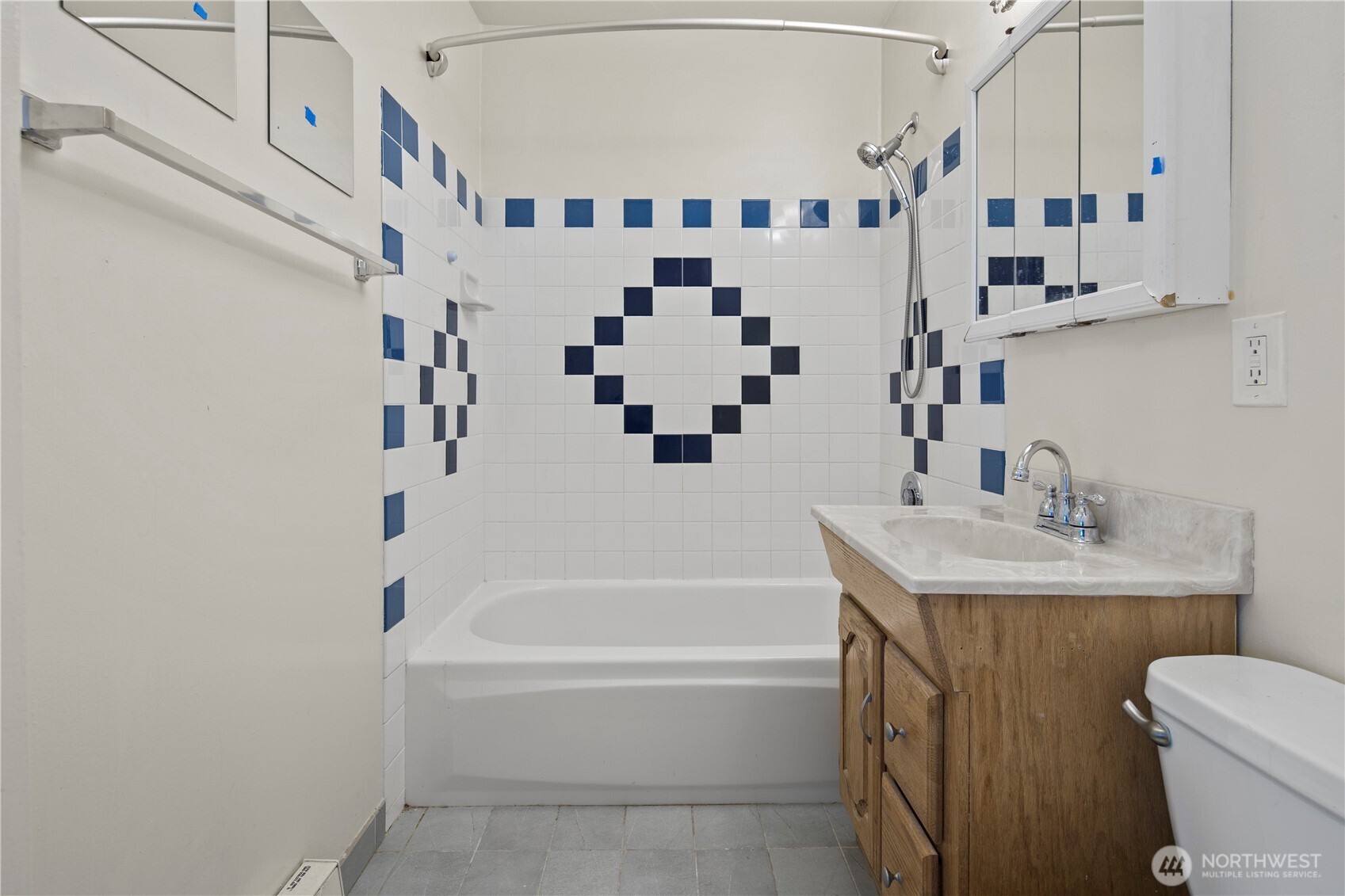 509 19th Avenue East Seattle, WA 98112 - Photo 18 of 40 a bathroom with a sink toilet and shower