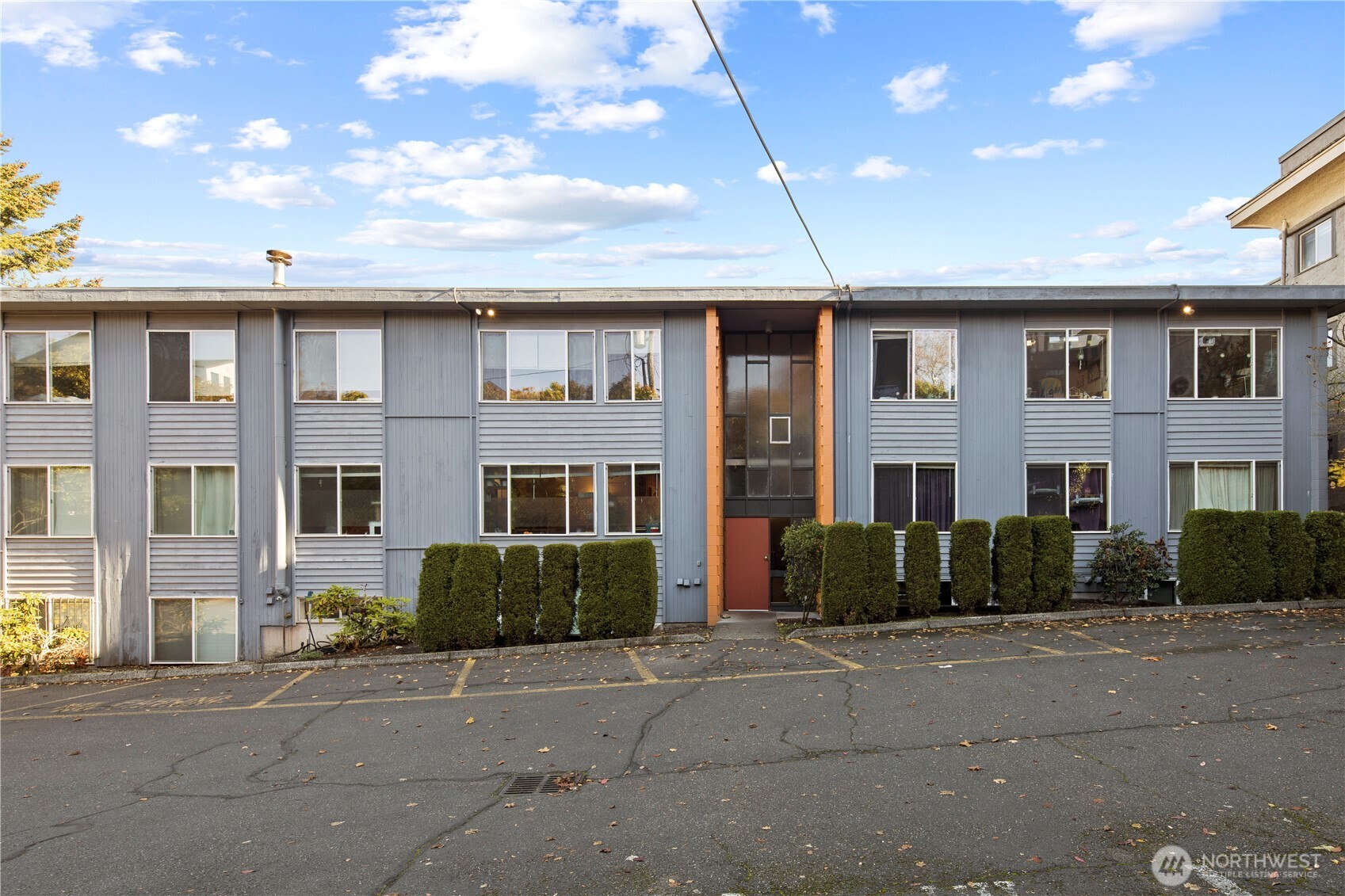 509 19th Avenue East Seattle, WA 98112 - Photo 32 of 40 a front view of a house with a yard