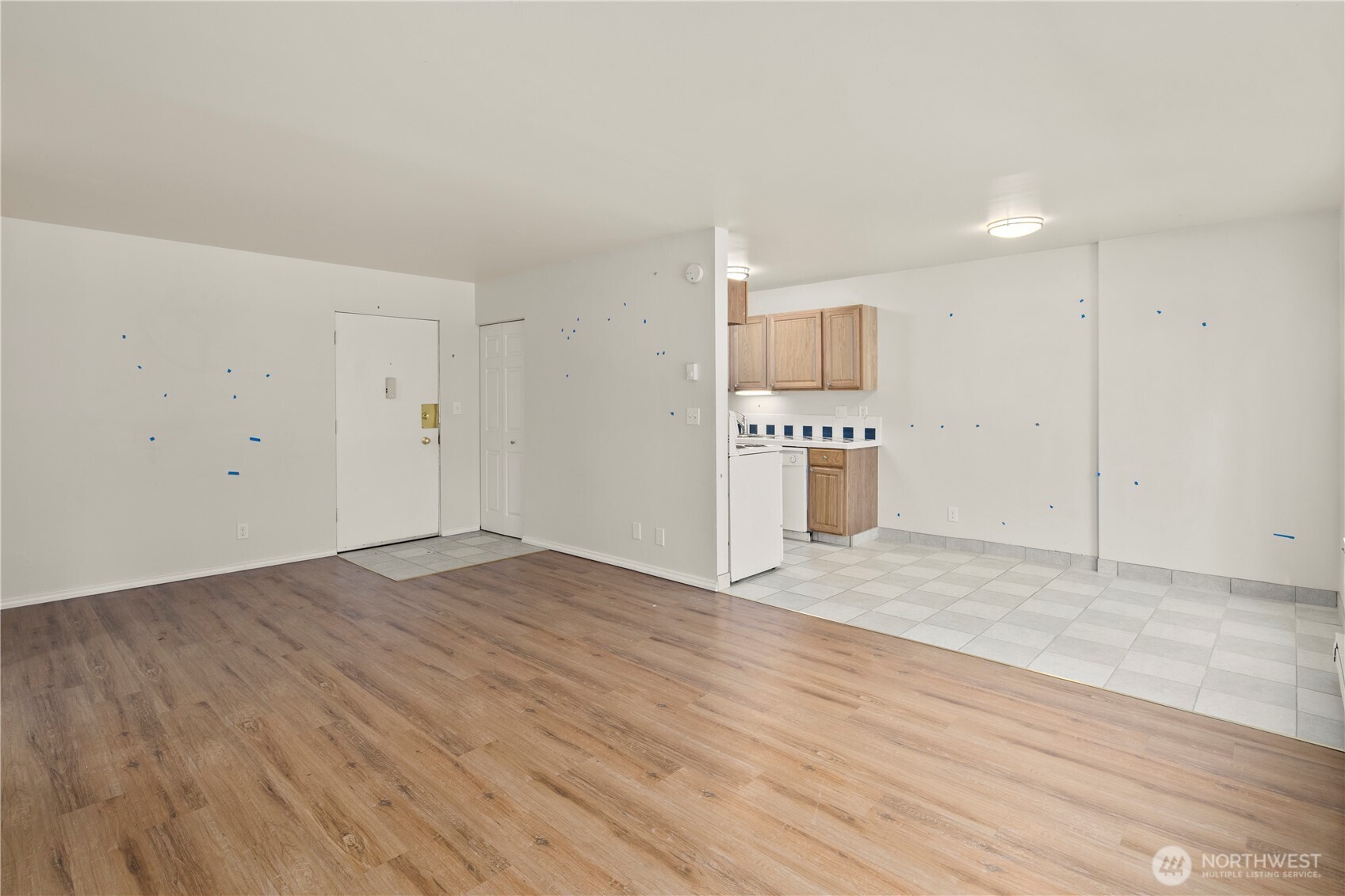 509 19th Avenue East Seattle, WA 98112 - Photo 8 of 40 a view of kitchen with wooden floor and electronic appliances