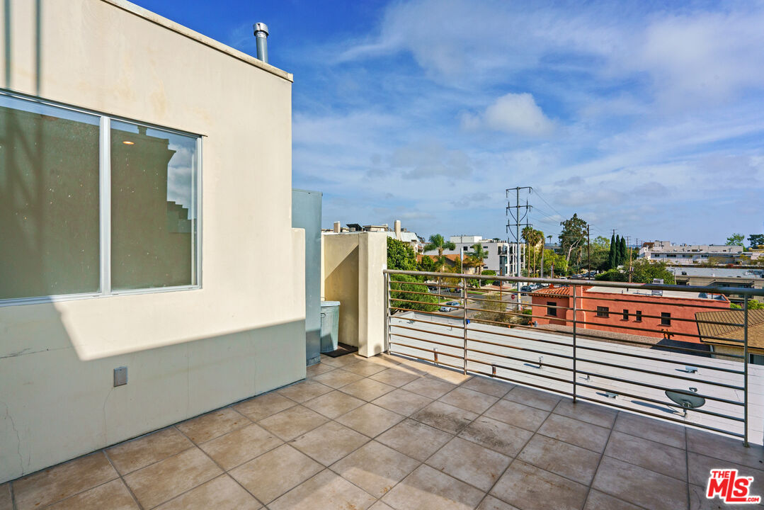 1809 Overland Avenue, Unit 5 Los Angeles, CA 90025 - Photo 6 of 15 a view of a balcony with city view