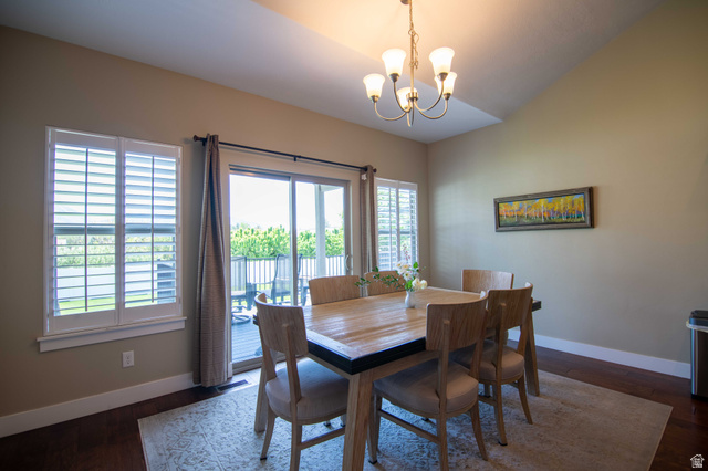 646 East 1400th Street North Mapleton, UT 84664 - Photo 20 of 78 Dining area featuring wood-finish flooring, vaulted ceilings, and a decorative chandelier
