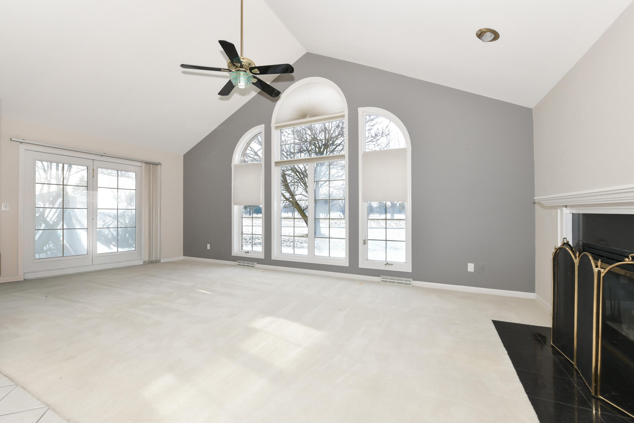 110 Eagle Pointe Drive, Unit 3A Delavan, WI 53115 - Photo 14 of 60 Living Room with Vaulted Ceiling