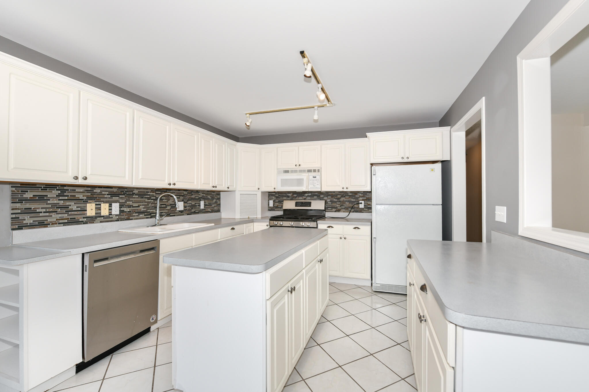 110 Eagle Pointe Drive, Unit 3A Delavan, WI 53115 - Photo 21 of 60 Crisp White Cabinetry