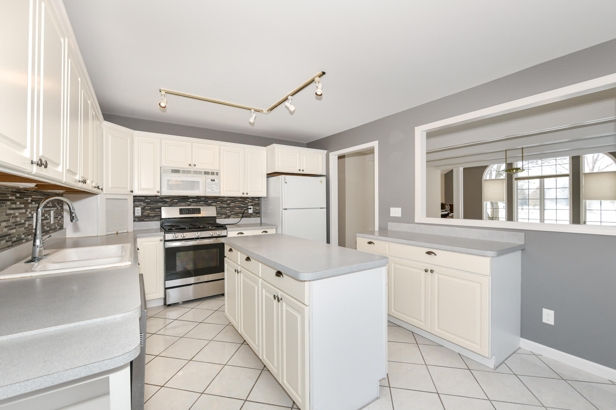 110 Eagle Pointe Drive, Unit 3A Delavan, WI 53115 - Photo 22 of 60 Kitchen Island