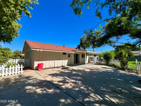 a view of a house with a park