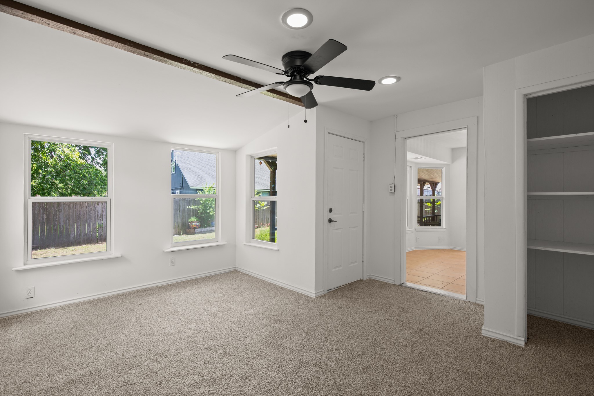 2109 Brandywine Lane Austin, TX 78727 - Photo 20 of 27 Unfurnished bedroom featuring carpet floors, vaulted ceiling, recessed lighting, and ceiling fan