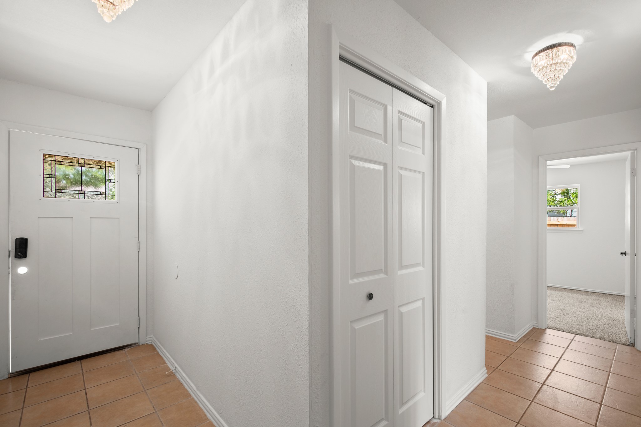 2109 Brandywine Lane Austin, TX 78727 - Photo 21 of 27 Entrance foyer featuring light tile patterned flooring and plenty of natural light