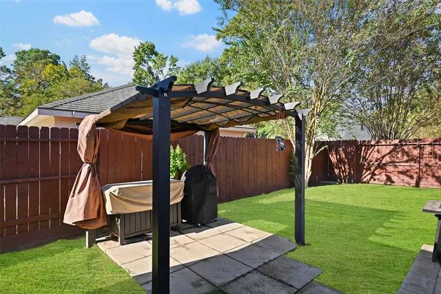 a view of a backyard with a garden