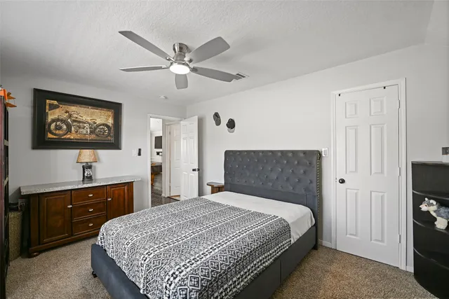a bathroom with a sink toilet and vanity