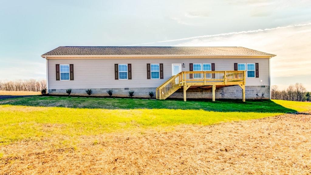 988 Calico Rock Road Rocky Mount, VA 24151 - Photo 1 of 41 a front view of house with garden and swimming pool