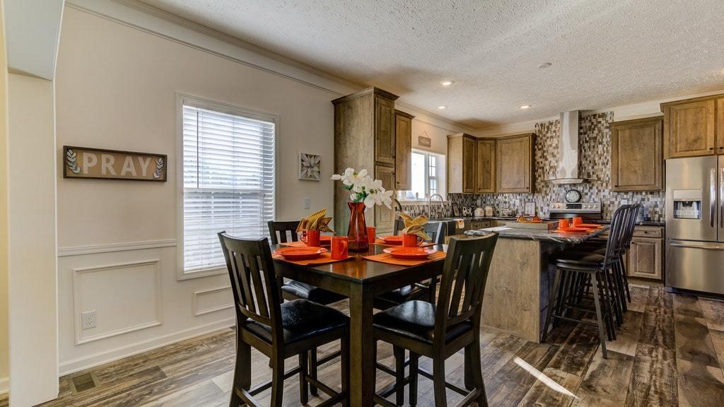 988 Calico Rock Road Rocky Mount, VA 24151 - Photo 18 of 41 a view of a dining room with furniture