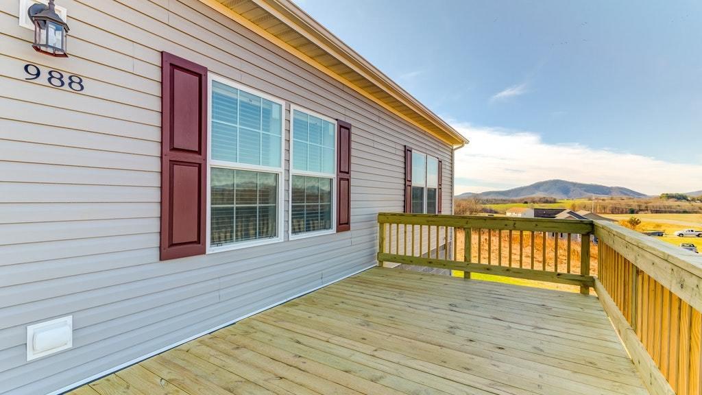 988 Calico Rock Road Rocky Mount, VA 24151 - Photo 3 of 41 a view of a balcony with wooden floor