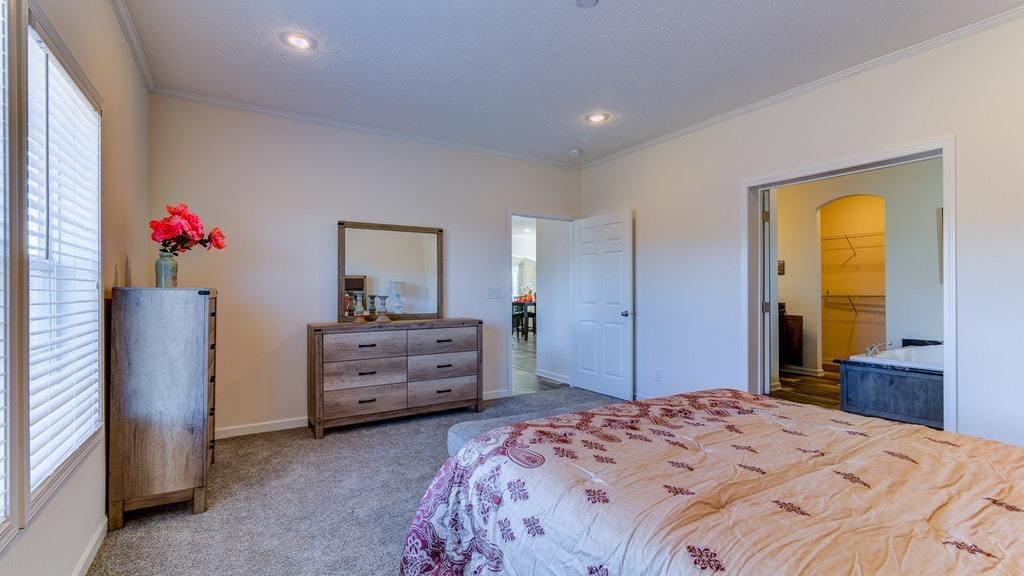 988 Calico Rock Road Rocky Mount, VA 24151 - Photo 31 of 41 a bedroom with a bed and a dresser
