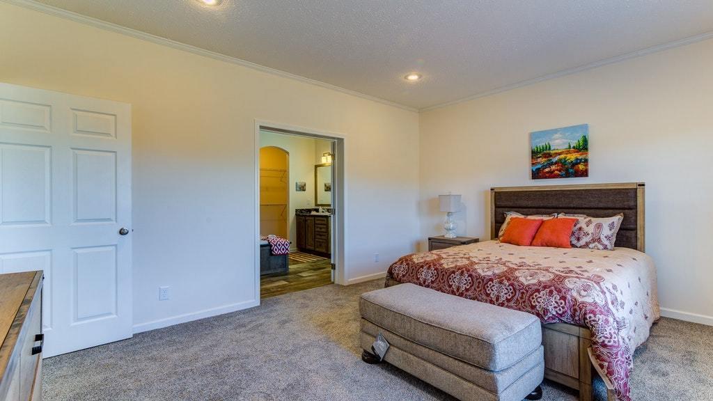 988 Calico Rock Road Rocky Mount, VA 24151 - Photo 32 of 41 a bedroom with a bed and a lamp