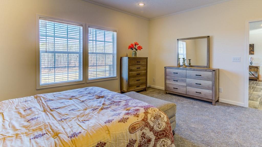 988 Calico Rock Road Rocky Mount, VA 24151 - Photo 37 of 41 a bedroom with a bed and a dresser