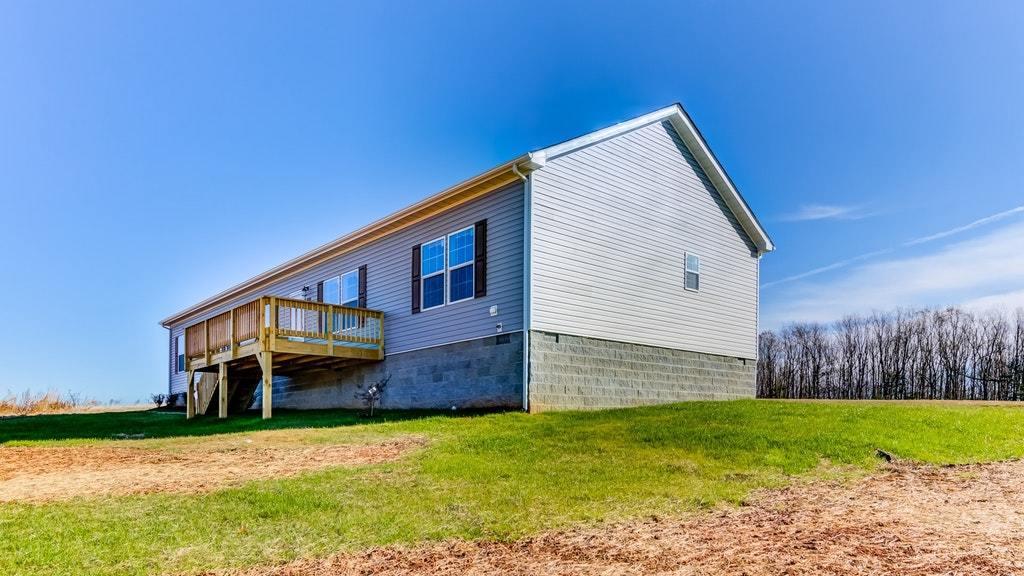 988 Calico Rock Road Rocky Mount, VA 24151 - Photo 41 of 41 a view of a house with a yard