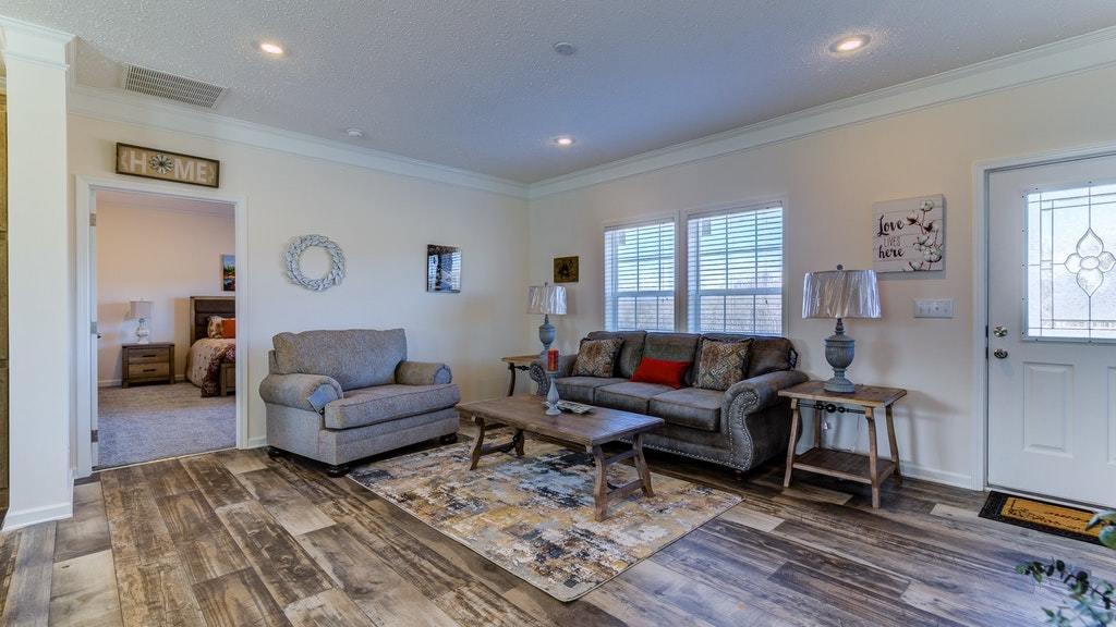 988 Calico Rock Road Rocky Mount, VA 24151 - Photo 6 of 41 a living room with furniture and a wooden floor