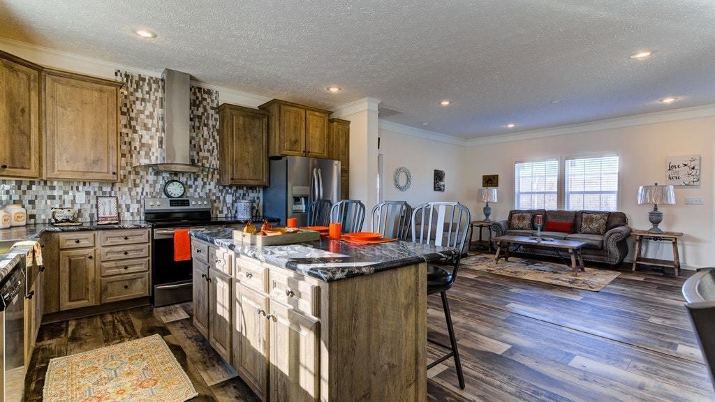 988 Calico Rock Road Rocky Mount, VA 24151 - Photo 10 of 41 a kitchen with stainless steel appliances granite countertop a stove and a refrigerator