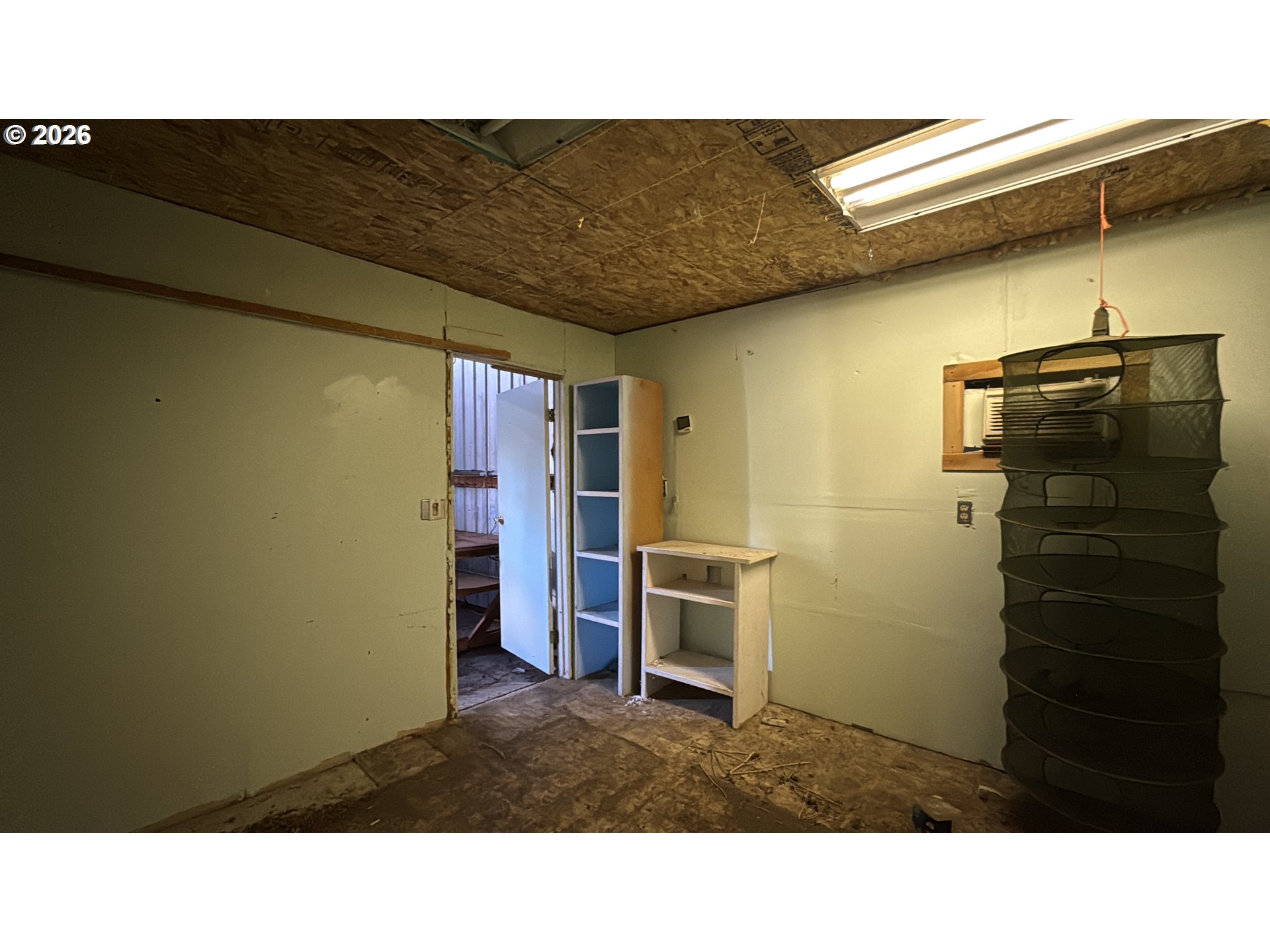 13469 Ramsey Road Gold Hill, OR 97525 - Photo 11 of 25 a black and white photo of a room