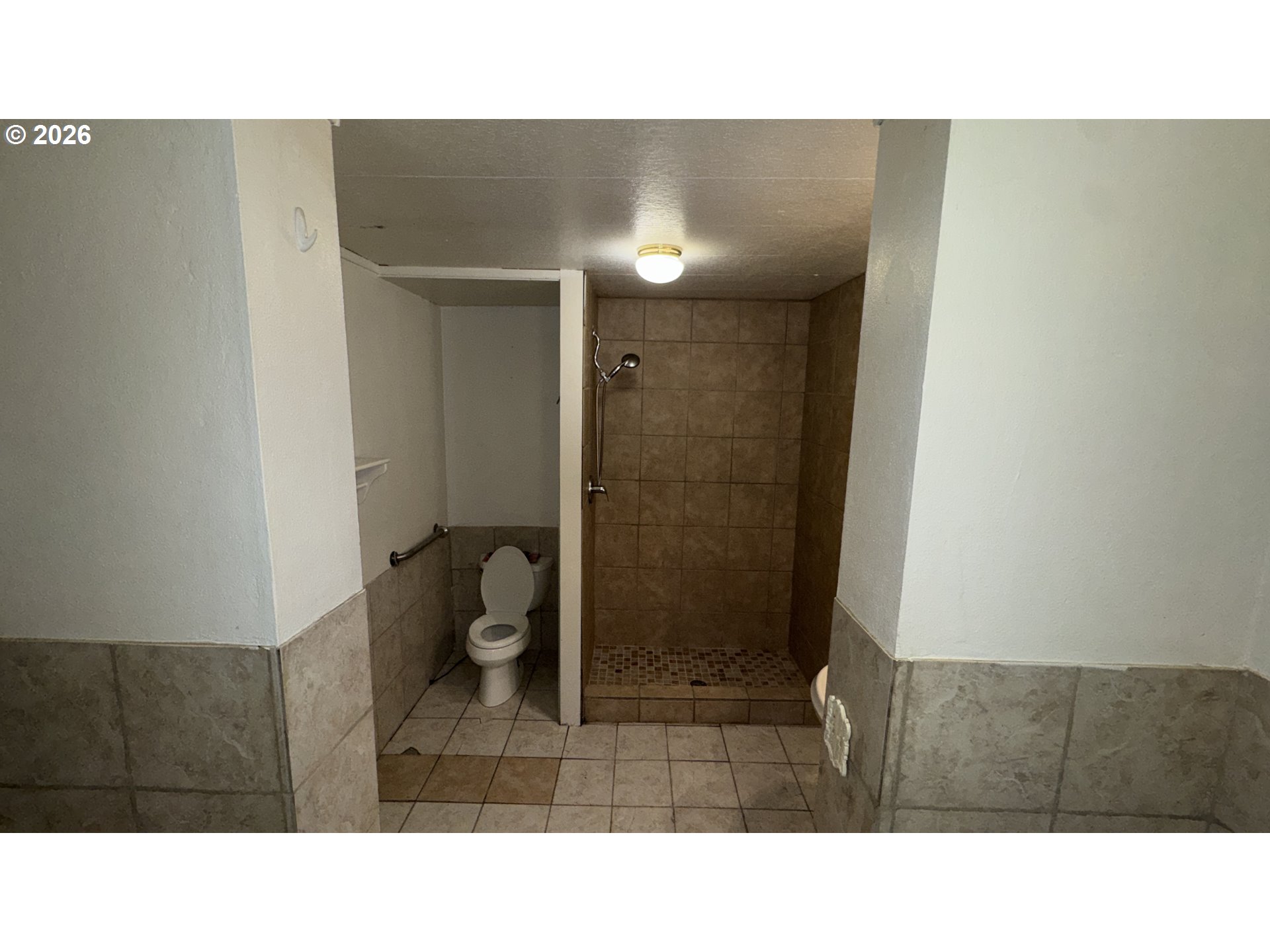 13469 Ramsey Road Gold Hill, OR 97525 - Photo 13 of 25 a bathroom with a sink and a shower