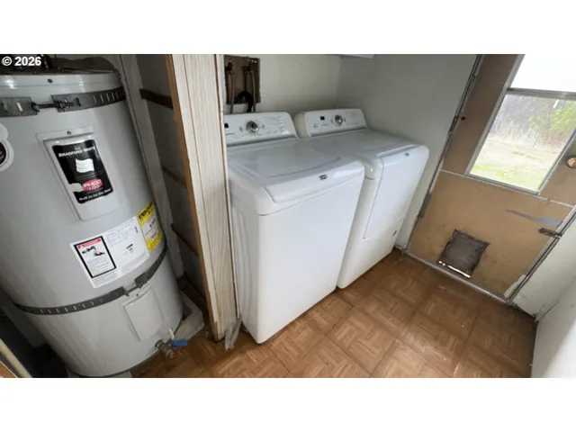 a bathroom with a sink mirror and toilet