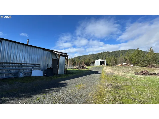 a black and white photo of a house
