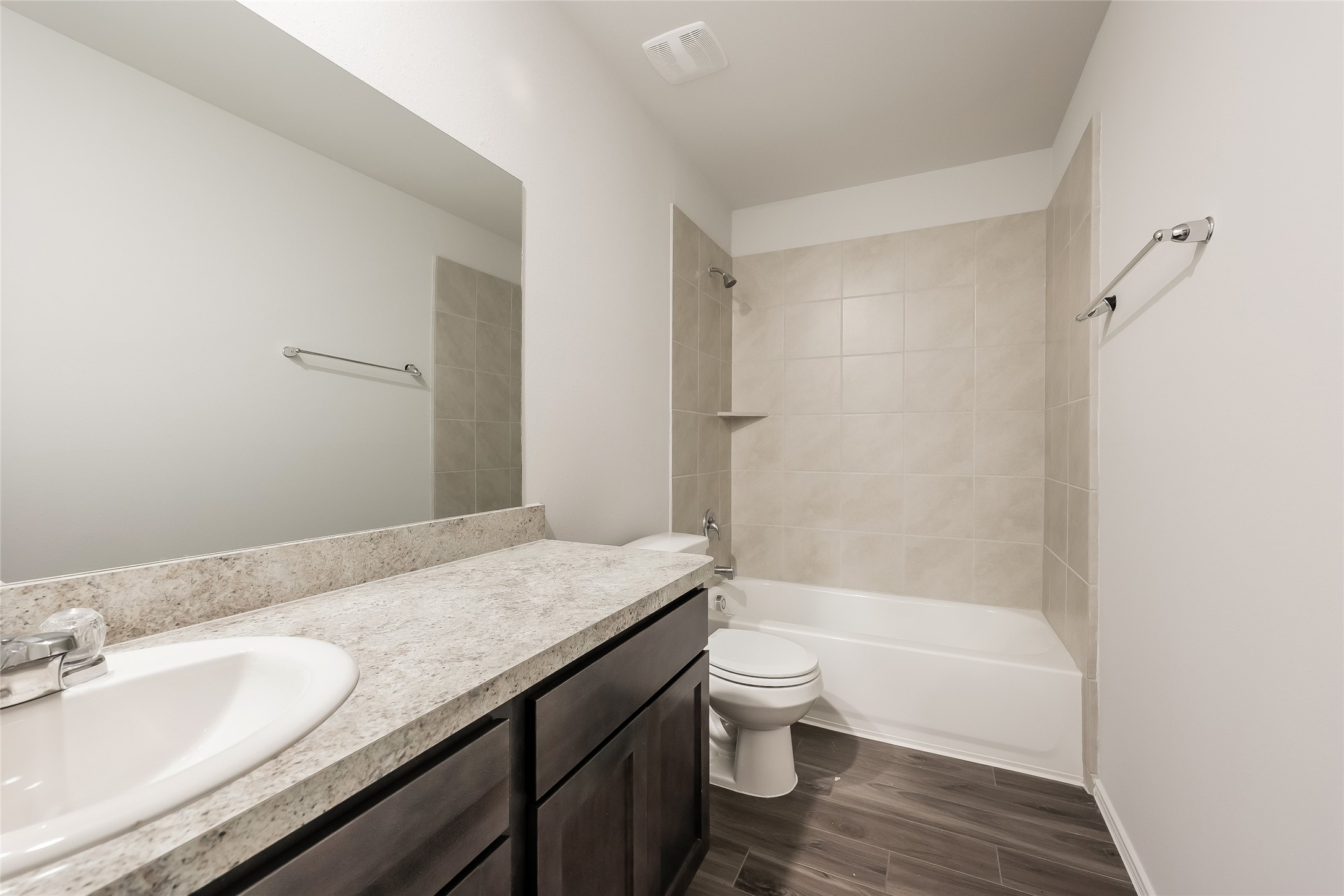 22211 Red Knot Run Splendora, TX 77372 - Photo 13 of 18 a bathroom with a granite countertop sink toilet and shower