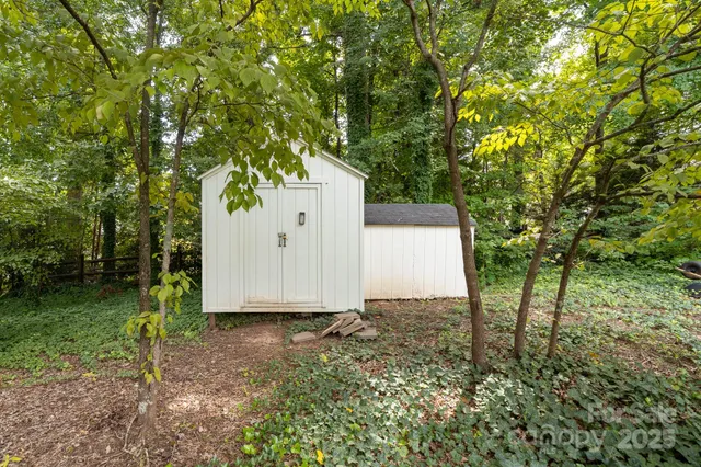 a view of a swimming pool with an outdoor space and seating area