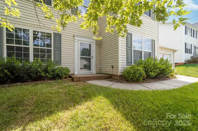 a view of a house with a garden