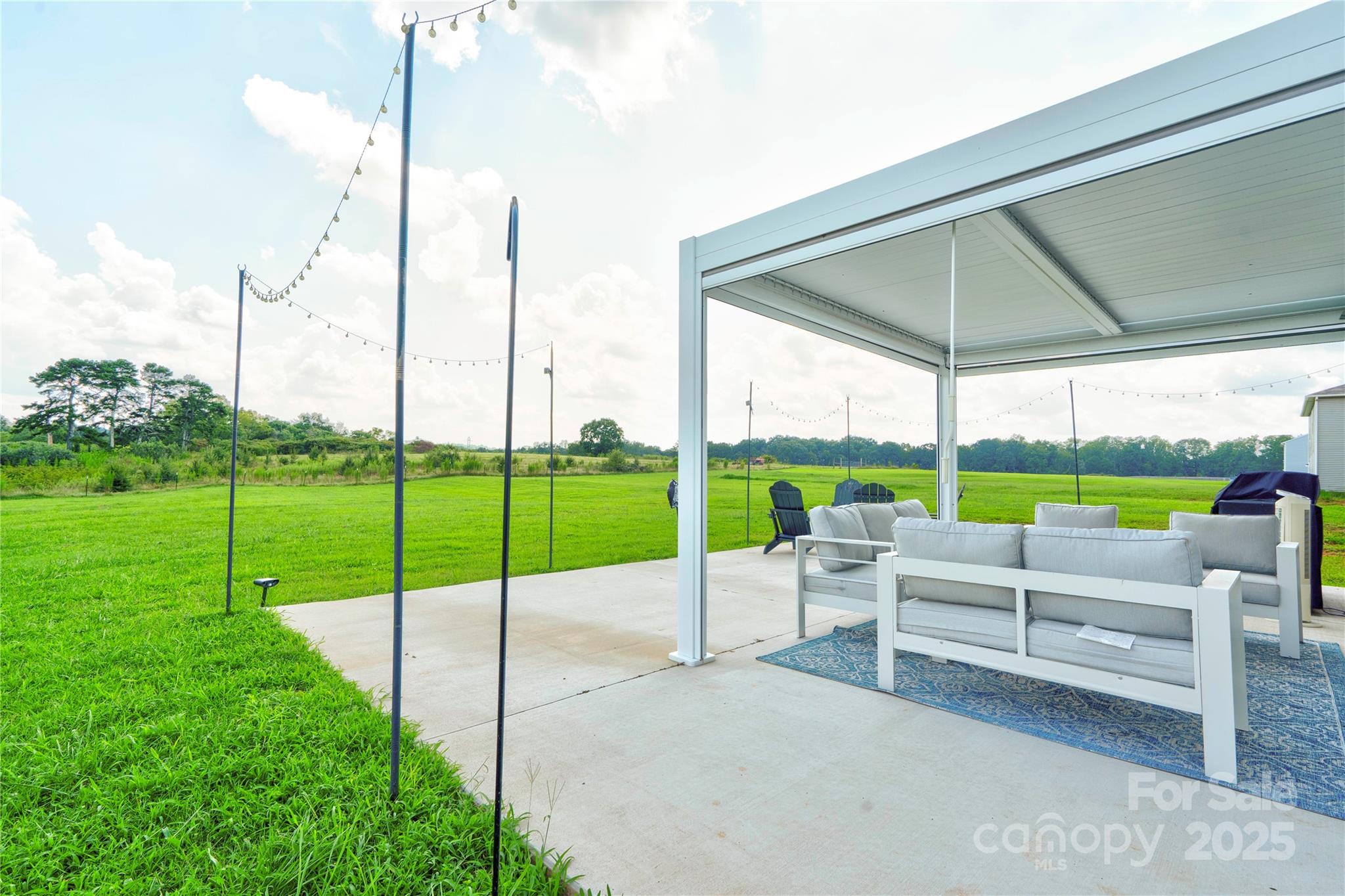 2344 Joes Lake Road Shelby, NC 28152 - Photo 11 of 47 a view of a park with a large window and chairs