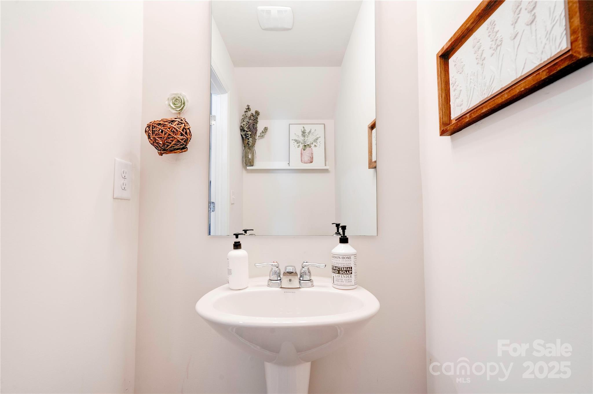 2344 Joes Lake Road Shelby, NC 28152 - Photo 22 of 47 a bathroom with a sink and a mirror