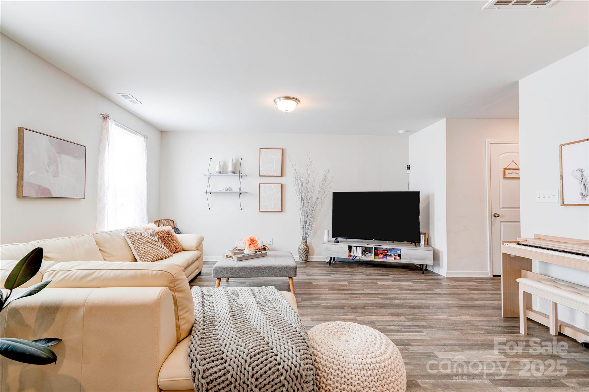 2344 Joes Lake Road Shelby, NC 28152 - Photo 24 of 47 a living room with furniture and a flat screen tv