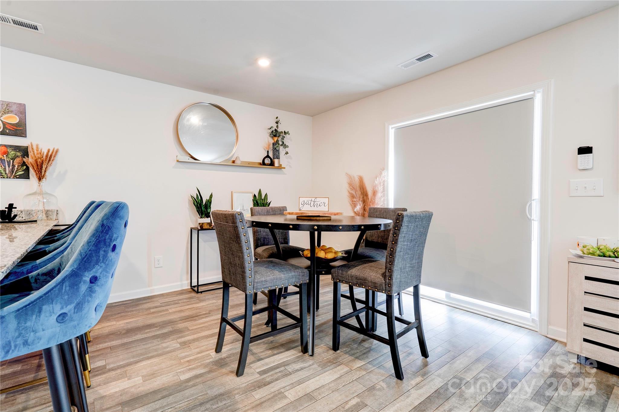 2344 Joes Lake Road Shelby, NC 28152 - Photo 27 of 47 a view of a dining room with furniture and wooden floor