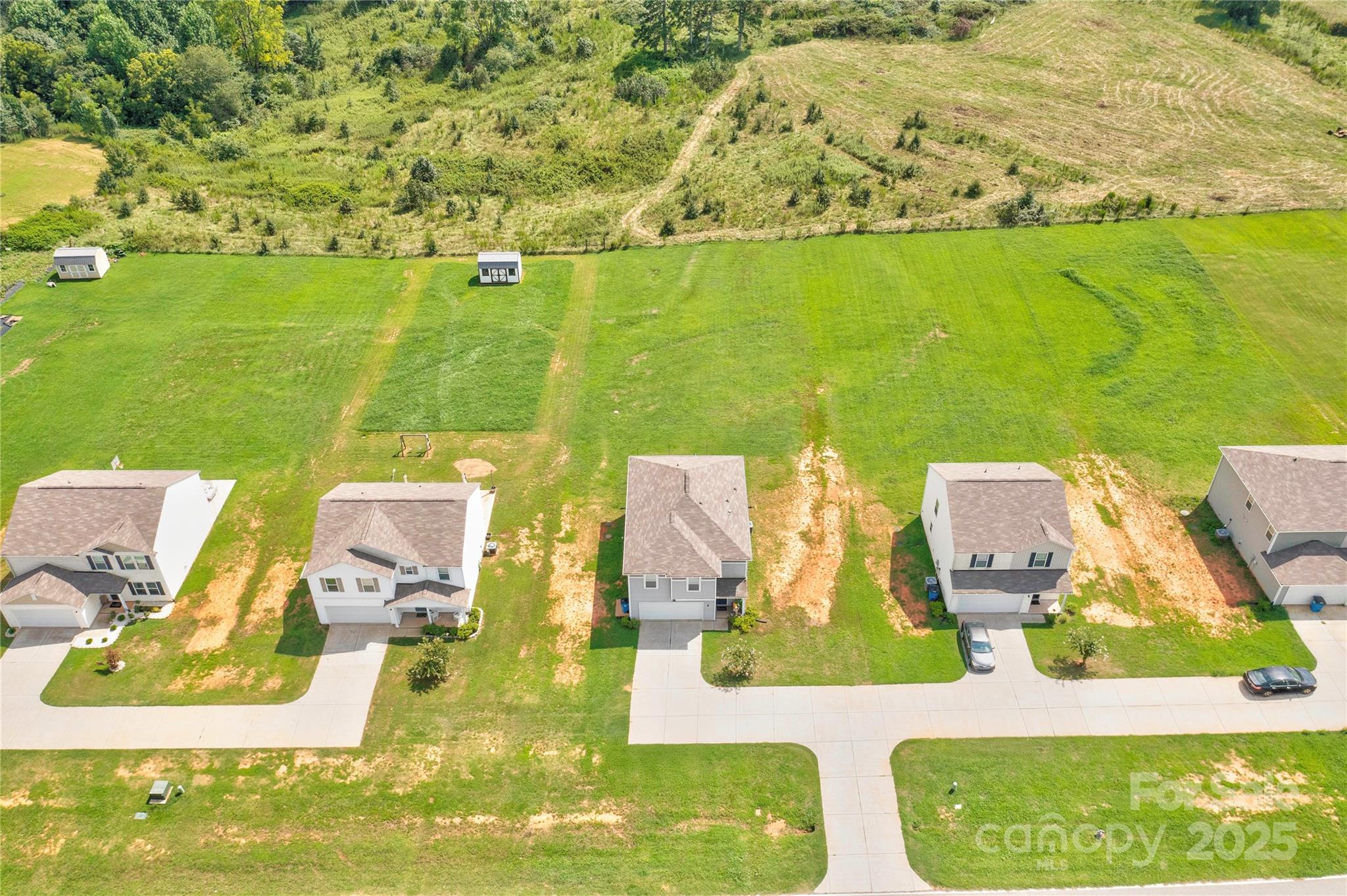 2344 Joes Lake Road Shelby, NC 28152 - Photo 3 of 47 an aerial view of residential houses with outdoor space and swimming pool