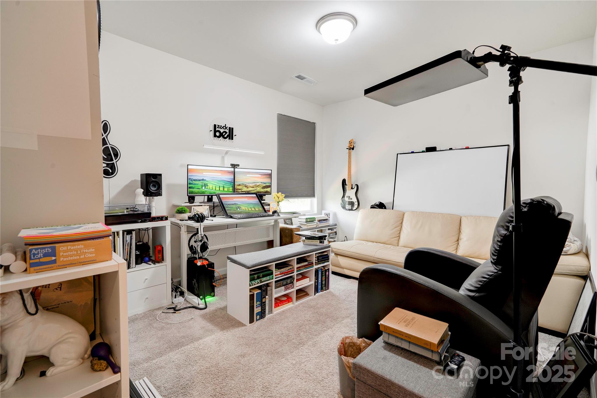 2344 Joes Lake Road Shelby, NC 28152 - Photo 43 of 47 a view of a workspace with furniture and a flat screen tv