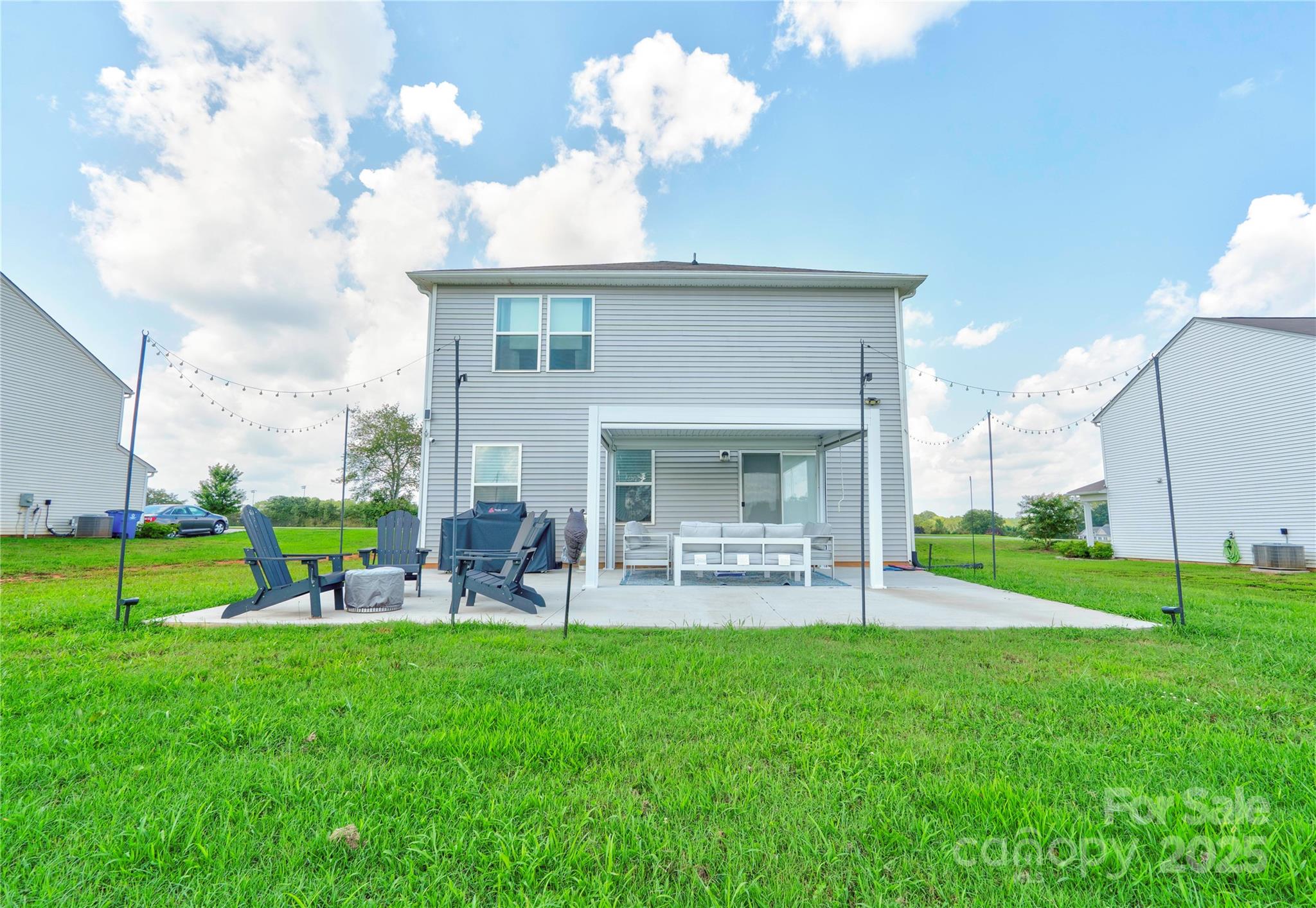 2344 Joes Lake Road Shelby, NC 28152 - Photo 8 of 47 a view of a house with a backyard porch and sitting area