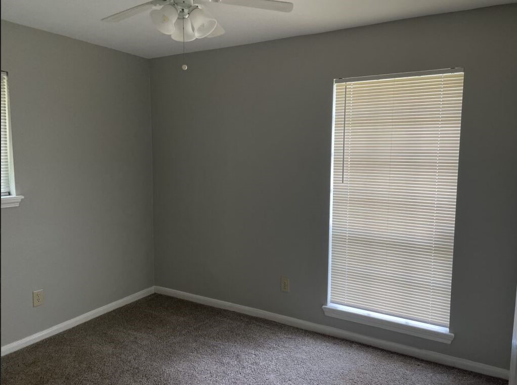 10715 Segrest Drive Houston, TX 77047 - Photo 8 of 9 an empty room with a window