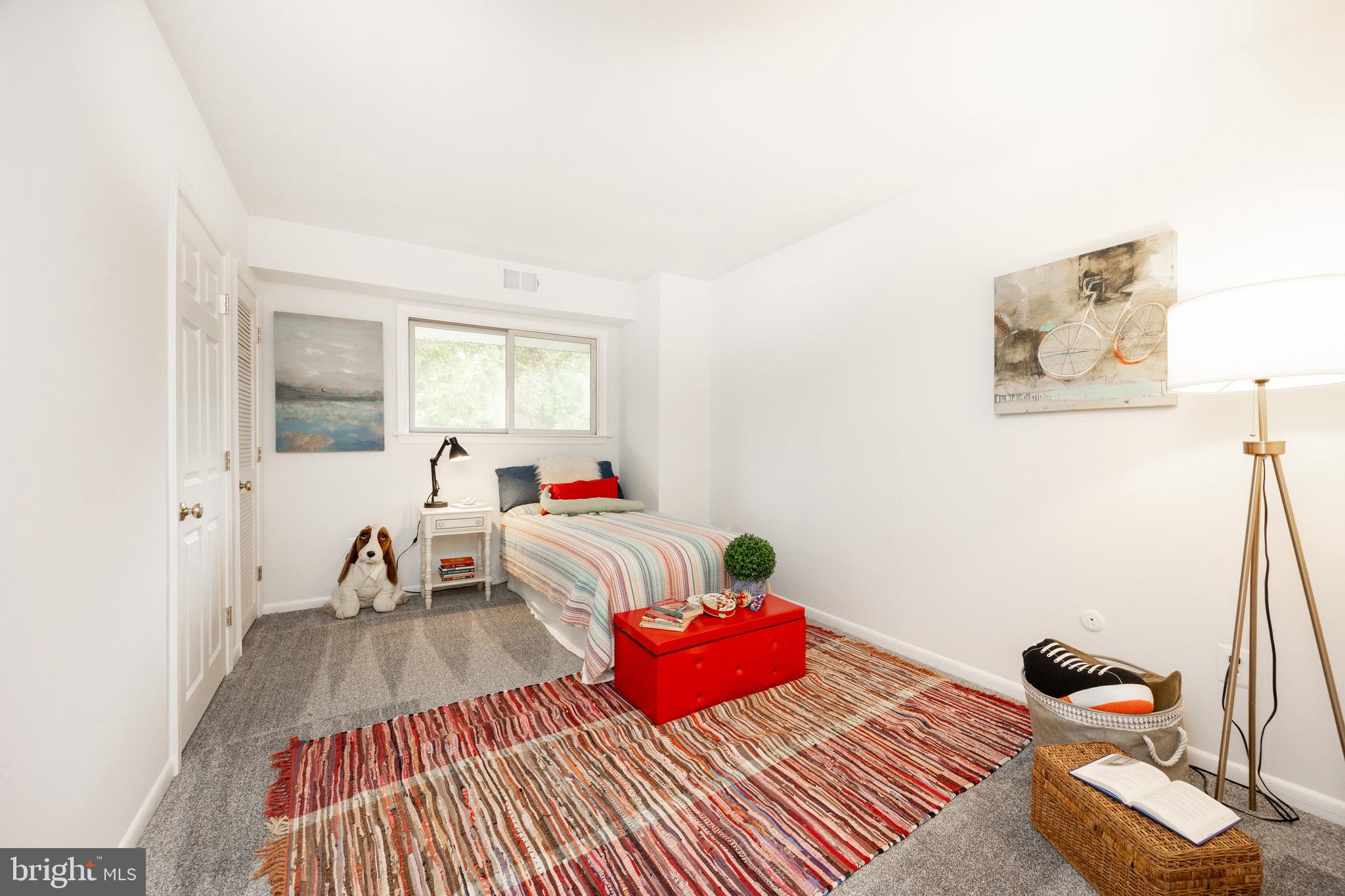 1518 Manley Road, Unit B17 West Chester, PA 19382 - Photo 18 of 25 a bedroom with a bed and wooden floor