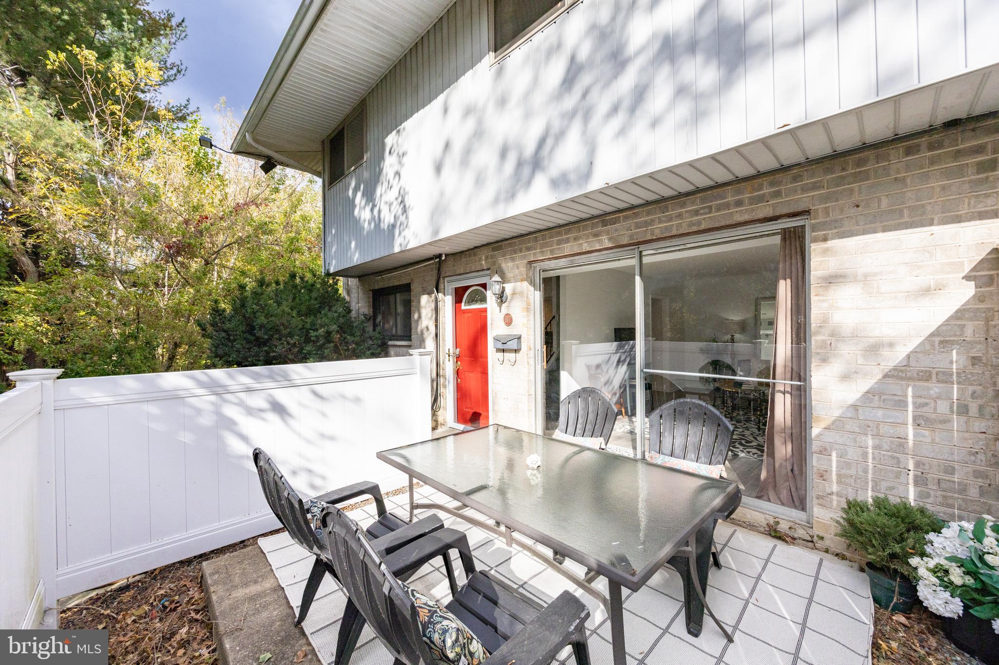 1518 Manley Road, Unit B17 West Chester, PA 19382 - Photo 22 of 25 a view of outdoor dining space with a table and chairs