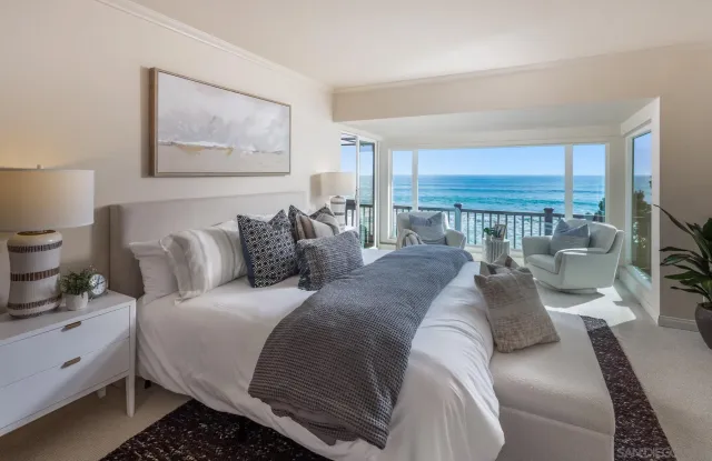 a bed room with a bed and a couch