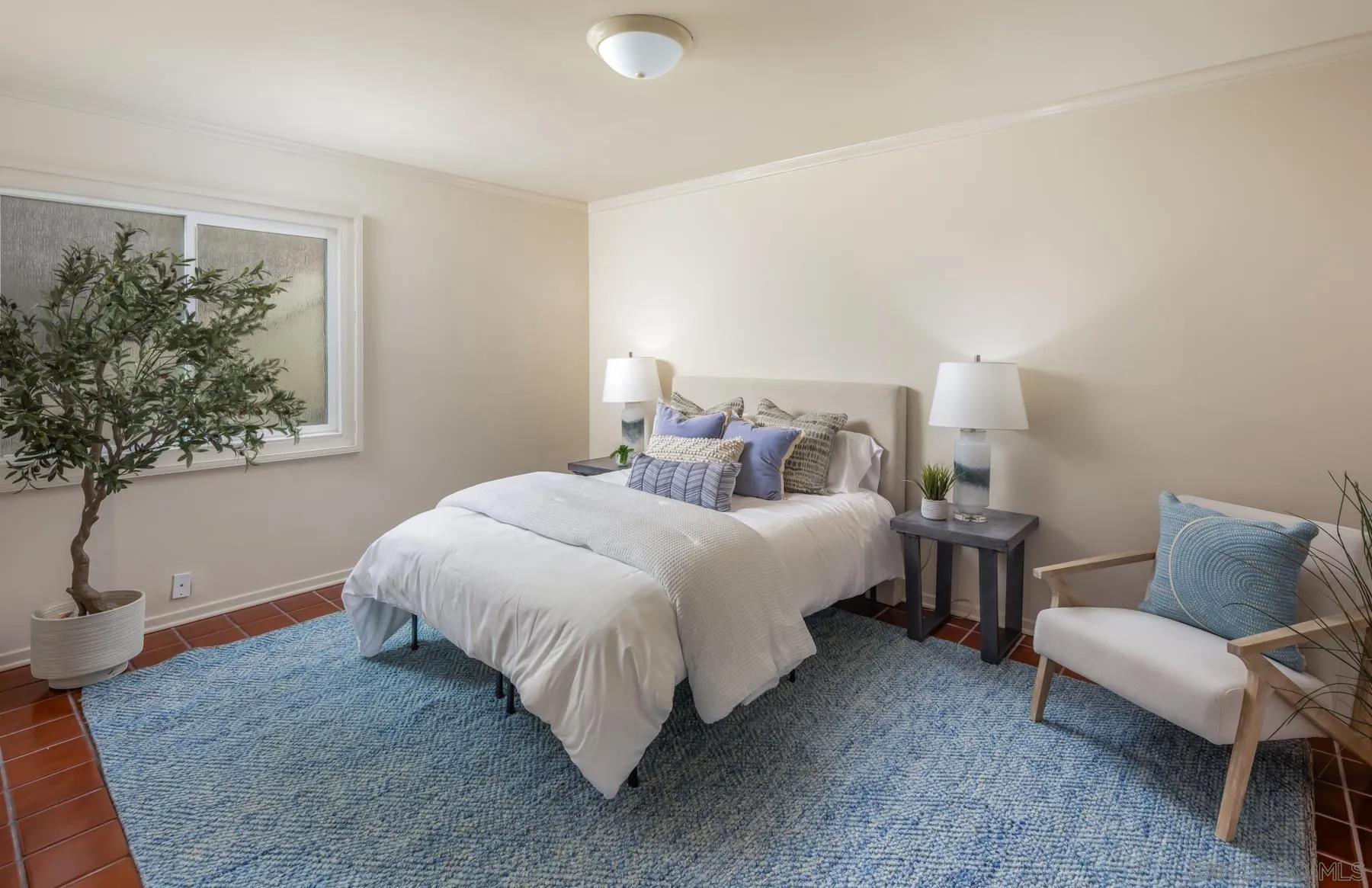2977 Ocean Street Carlsbad, CA 92008 - Photo 26 of 44 a bedroom with bed and a window